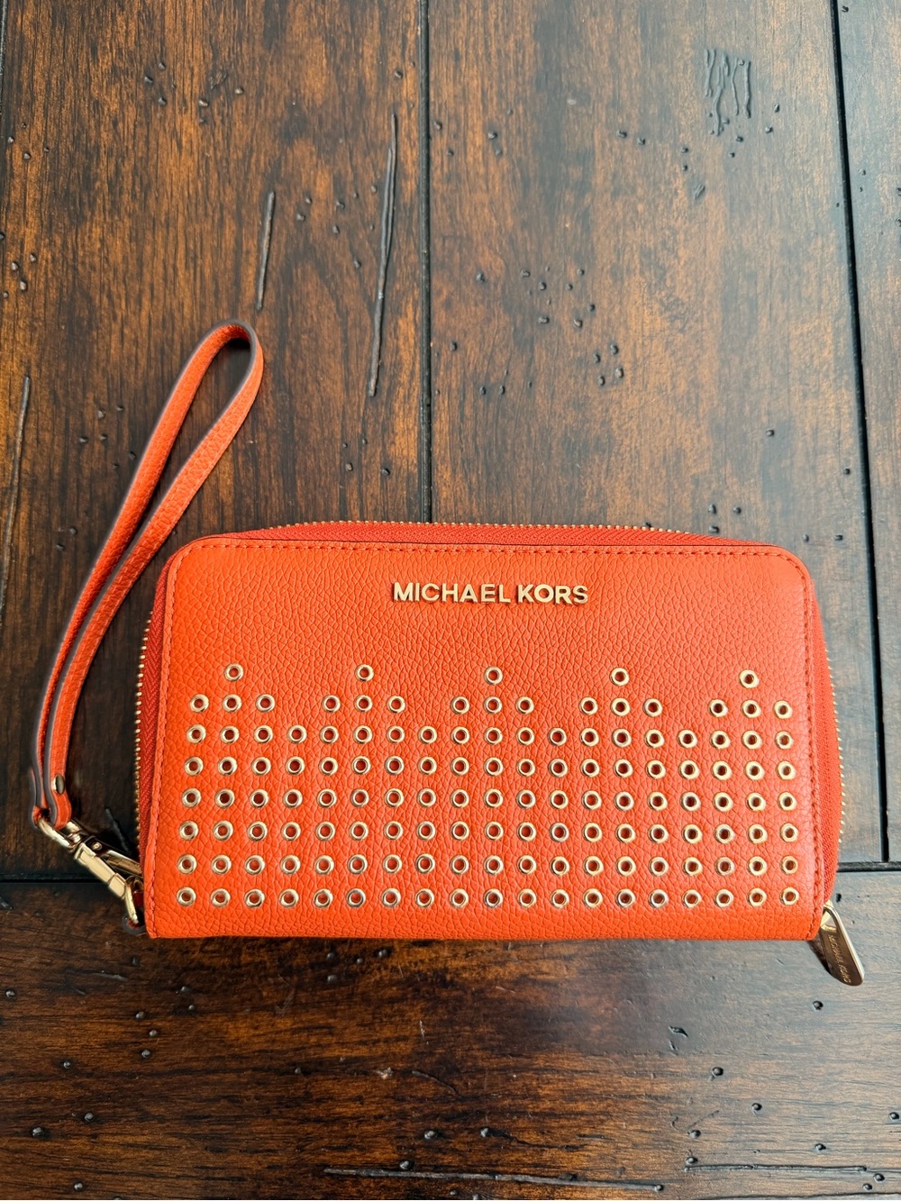 Michael Kors Orange Eyelet-Detail Wristlet Wallet